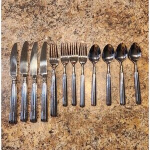 Gibson Stainless Steel 12 Pc Flatware 4 Spoons. 4 Forks, 4 Butter Knives. China